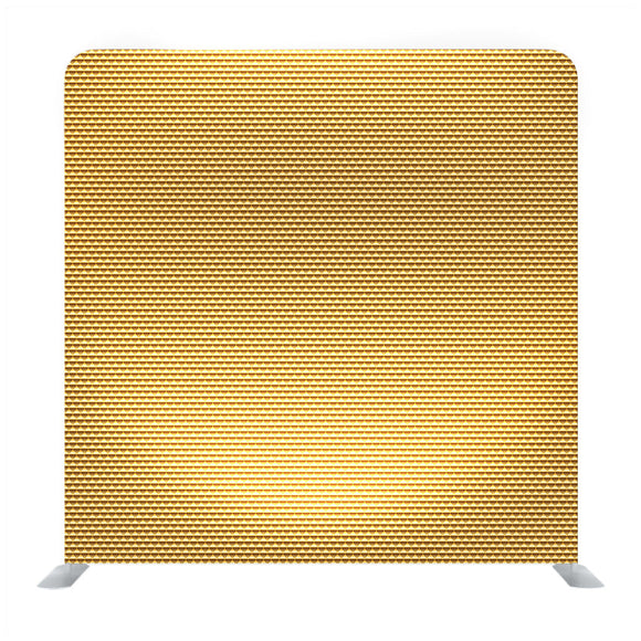 A close-up of golden fabric background texture backdrop