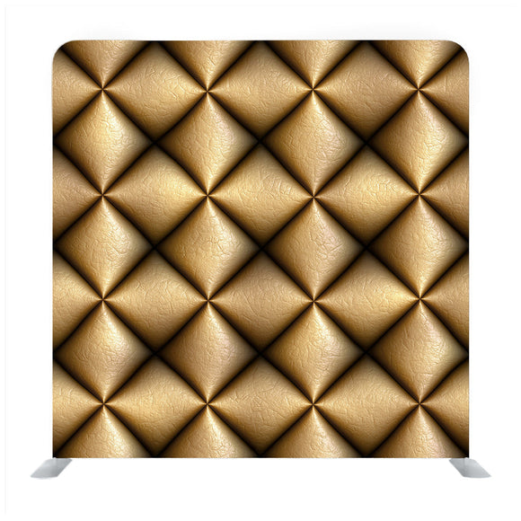 A close-up of golden fabric background texture backdrop